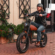 Prowler Vintage Ebike Revi Bikes 20Ah 1500W bafang motor Side view  with rider 