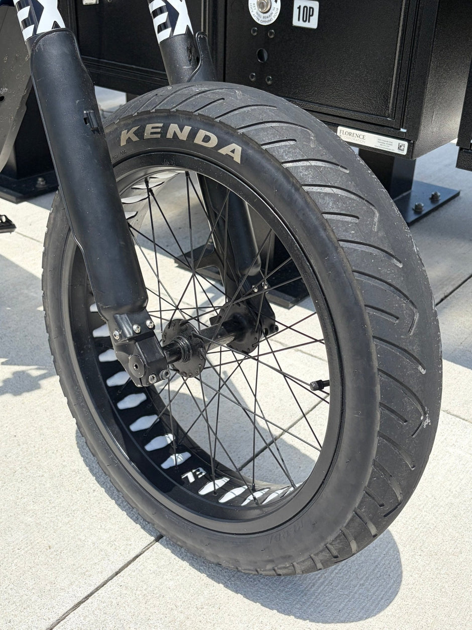 Kenda Kraze 20x4.25 supermoto e-bike tire on a front suspension fork wheel