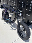 Super73 style e-bike fitted with Kenda Kraze 20x4.25 supermoto street tires, front three-quarter view