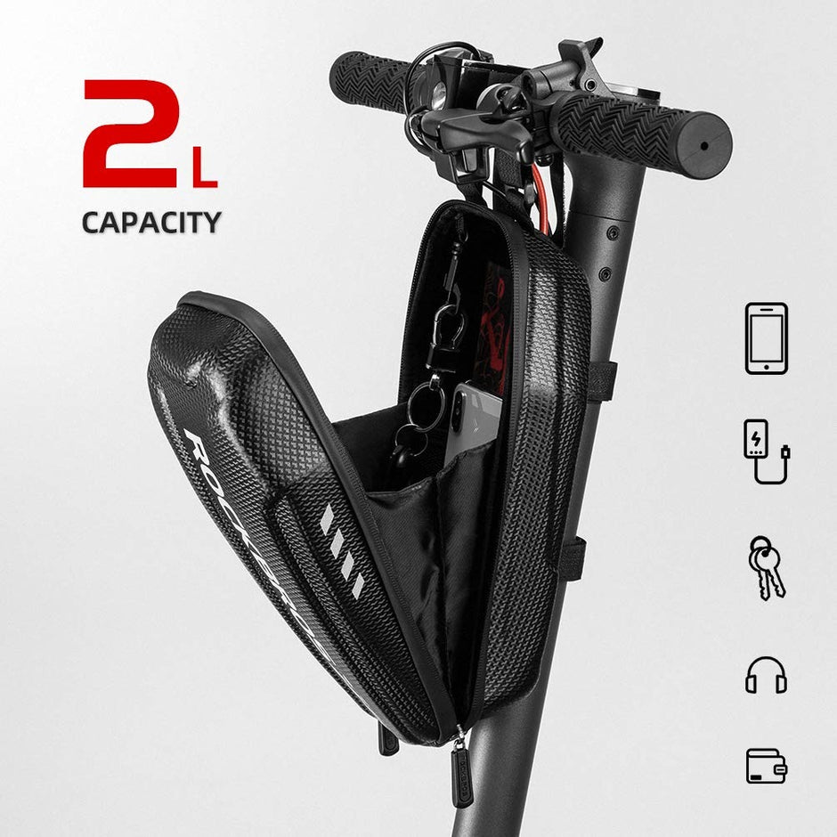 ROCKBROS B62 2L scooter bag open showing capacity for phone, keys, earbuds and wallet