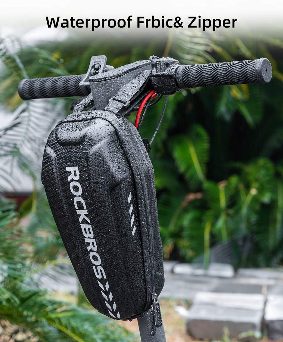 ROCKBROS hard shell bag on a scooter stem covered in rain drops, showing the water-repellent PU shell