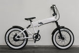 Vee Tire Co. E-Speedster white wall fat tires on a moped-style electric bike, drive-side view
